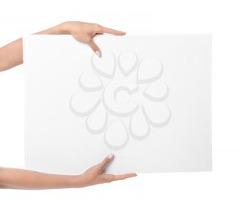 Female hands with blank poster on white background�