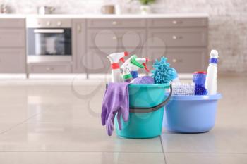 Set of cleaning supplies in kitchen�