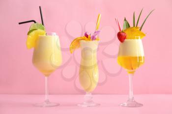 Glasses of tasty Pina Colada cocktail on table�