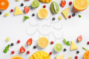 Sweet ripe fruits and berries on white background�