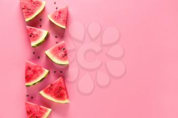 Slices of sweet ripe watermelon on color background�