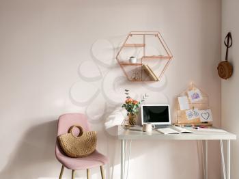Comfortable workplace with mood board in room�