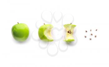 Fresh ripe apples and core on light background�