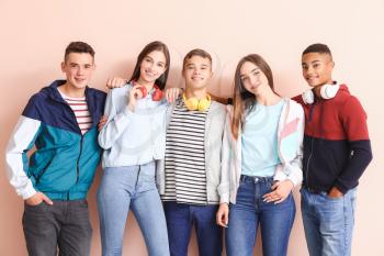 Portrait of teenagers on color background�