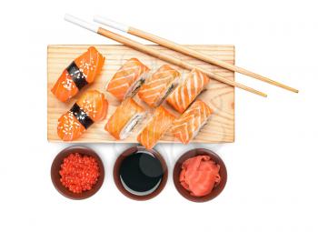 Composition with different sushi on white background�