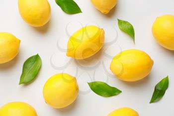 Ripe lemons on white background�