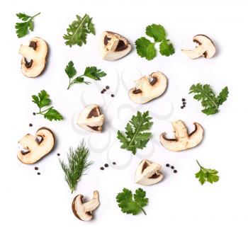 Fresh cut champignon mushrooms, herbs and spices on white background�