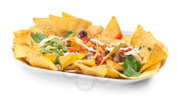 Plate with tasty chili con carne, guacamole and nachos on white background�