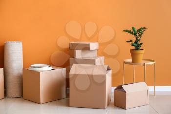 Cardboard boxes with belongings in new flat on moving day�