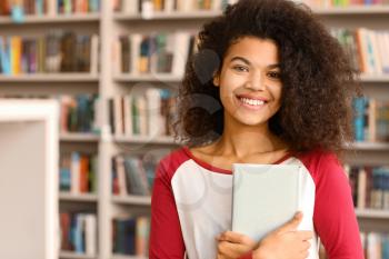 Portrait of African-American student in library�