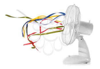 Electric fan with fluttering ribbons on white background�