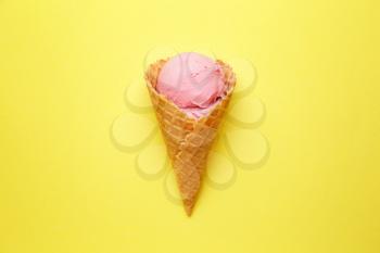 Sweet tasty ice-cream on color background�