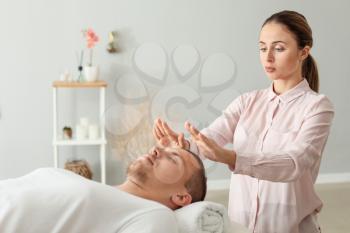 Reiki master working with patient�