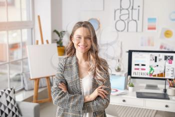 Portrait of female interior designer in office�