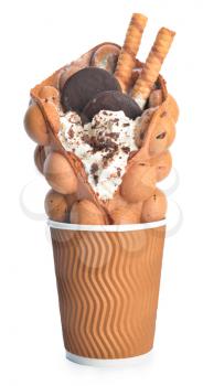 Delicious sweet bubble waffle in cup on white background�