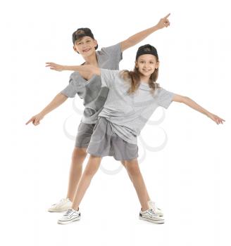 Cute little children dancing against white background�
