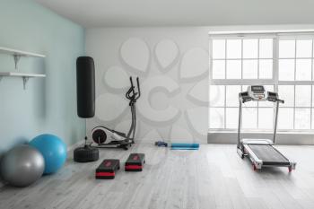Interior of modern gym with exercise machines�