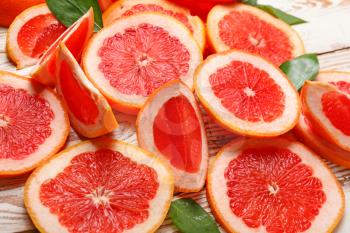 Fresh cut grapefruit on table�