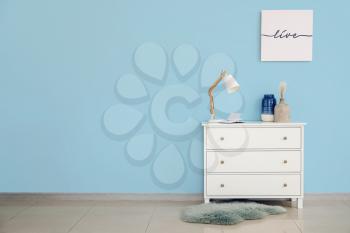Modern chest of drawers in room�