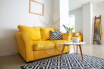 Interior of modern studio apartment with comfortable sofa�