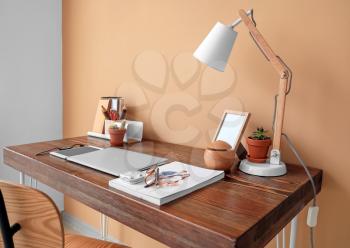 Comfortable workplace with modern computer in office�