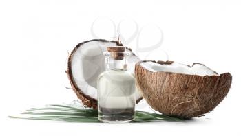 Bottle with coconut essential oil on white background�