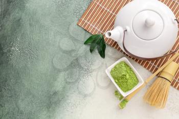 Composition with powdered matcha tea on color background�