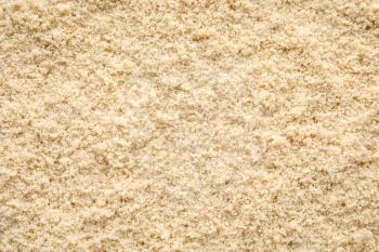 Almond flour as background, closeup�