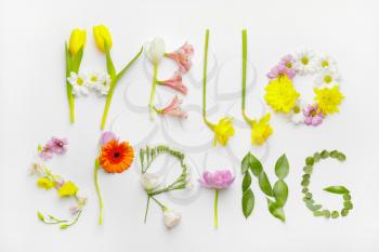 Text HELLO SPRING made of flowers on white background�