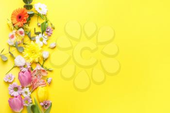 Many beautiful spring flowers on color background�