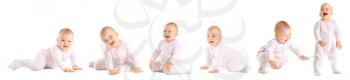 Cute little baby learning to walk on white background�