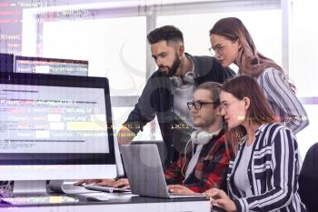 Team of programmers working in office�