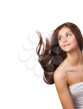 Pretty young woman with streaming hair isolated on white background
