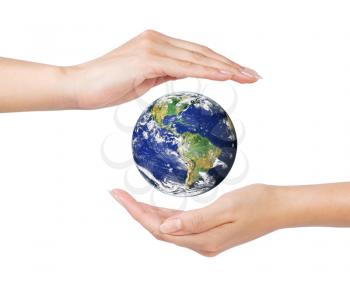 woman open hands surrounding the Earth on white (Earth image by NASA at visibleearth.nasa.gov)