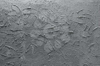 Gray textured wall.  As background or backdrop.
