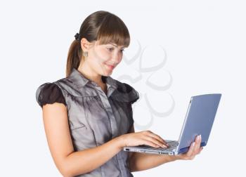 young beautiful businesswoman with laptop on white background