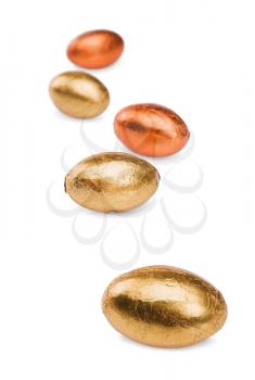 Golden  Easter eggs isolated on a white background 