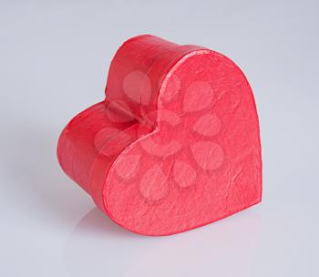 Heart shaped Valentines Day gift box on gray background