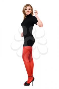 Royalty Free Photo of a Woman in a Black Dress and Red Tights