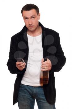 Royalty Free Clipart Image of a Man With a Cellphone and a Bottle of Whiskey