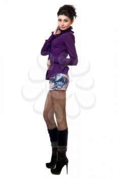 Royalty Free Photo of a Woman in a Short Skirt and High Boots
