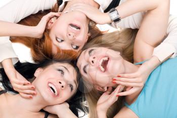 Royalty Free Photo of Three Women Lying Together