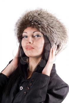 Royalty Free Photo of a Woman in a Fur Cap