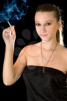 Royalty Free Photo of a Woman Smoking