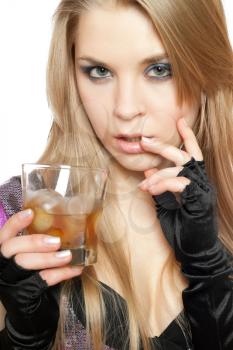 Royalty Free Photo of a Woman With a Glass of Whiskey
