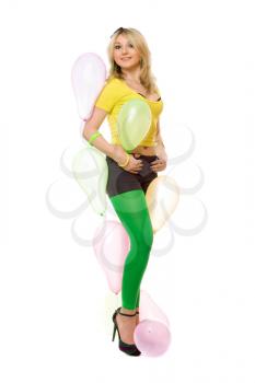 Pretty young sexy blond woman with balloons