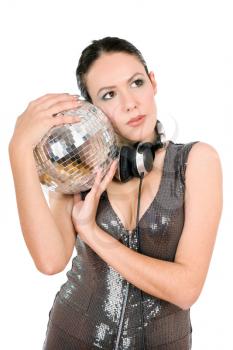 Portrait of sexy young brunette with a mirror ball in her hands. Isolated on white