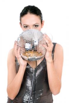 Portrait of brunette with a mirror ball in her hands. Isolated on white