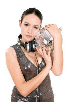 Portrait of nice young brunette with a mirror ball in her hands. Isolated