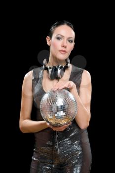 Portrait of woman with a mirror ball in her hands. Isolated on black